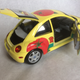 Illustration for article titled RED GOLD VW New Beatle 1:18